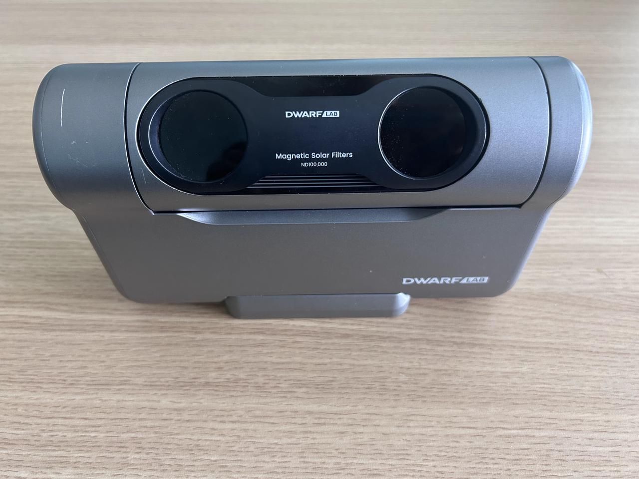 Close-up of magnetic solar filters being installed on the DWARF 3 telescope lens.