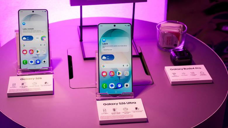 A lineup of new Samsung Galaxy S26 series smartphones displayed at a launch event.