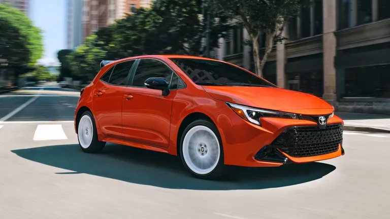 2026 Toyota Corolla Hatchback FX Edition with black roof and white wheels.