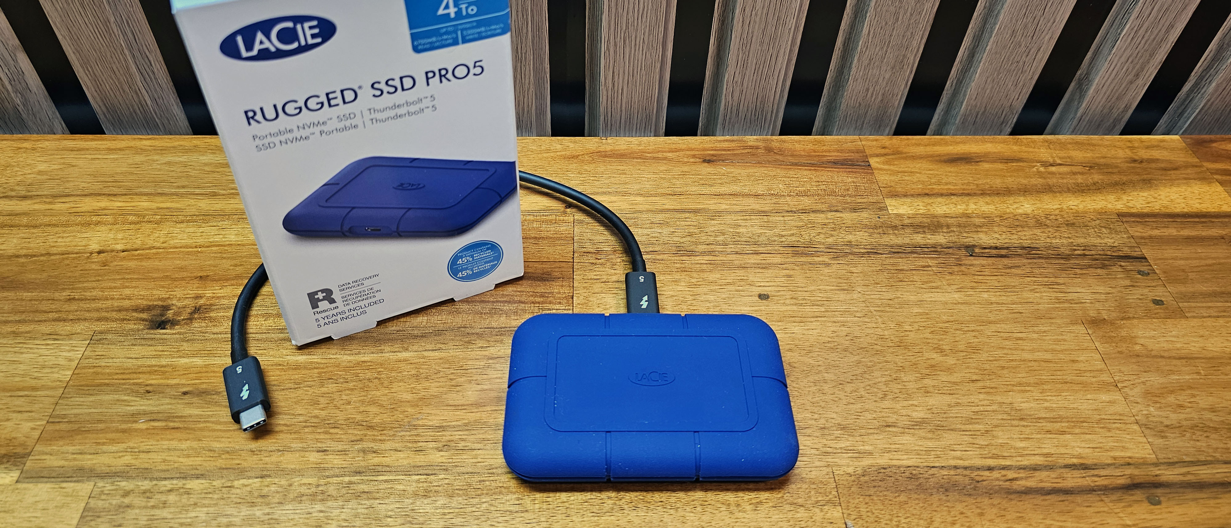 A sleek, black LaCie Rugged SSD Pro external drive designed for high-speed data transfer.