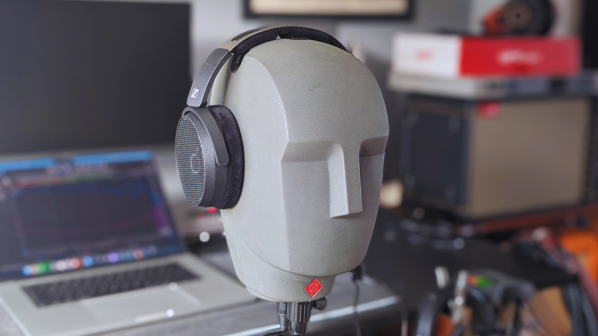 Sennheiser HD 490 Pro studio headphones placed on a Neumann KU 100 dummy head.