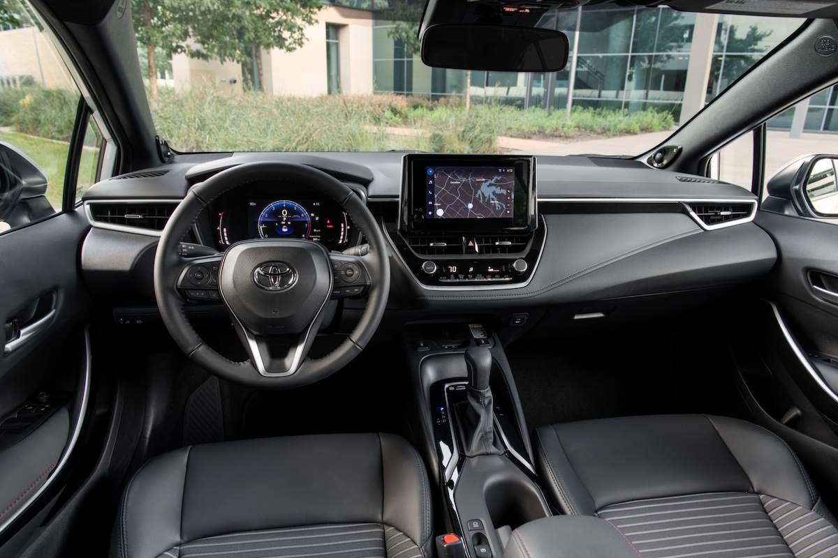 Close-up of the 2026 Toyota Corolla dashboard focusing on the large central infotainment touchscreen.