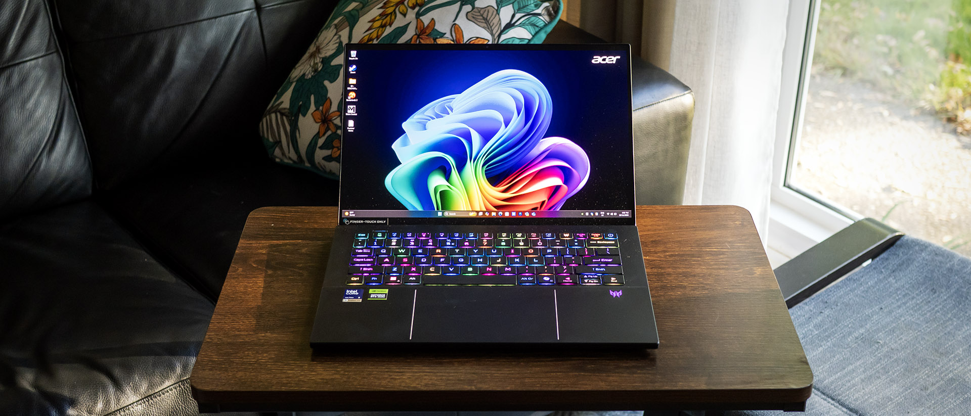 Close-up of the Acer Predator Triton 14 AI showing vibrant OLED display colors.