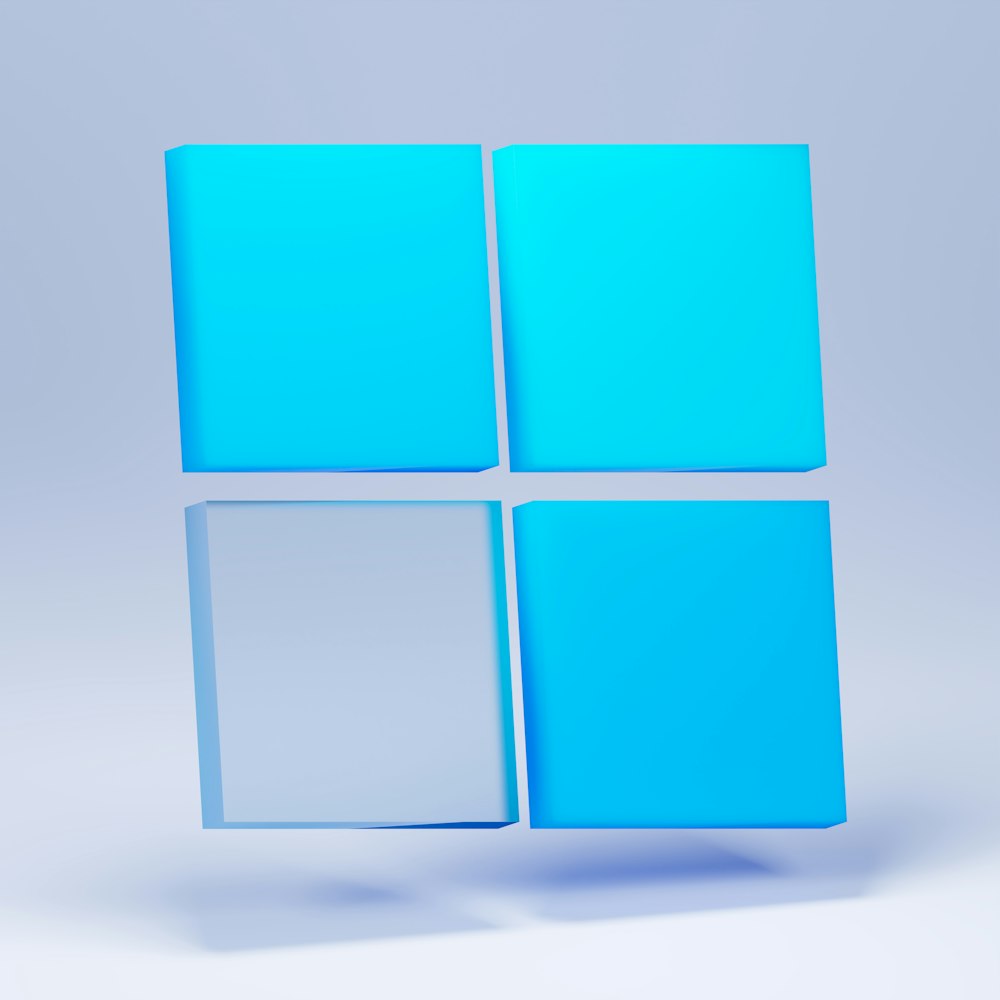 Windows 11 logo displayed on a blue digital background.