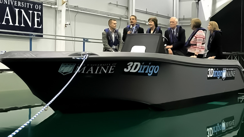 The 3Dirigo, a large 3D-printed patrol boat, floating in a testing facility.