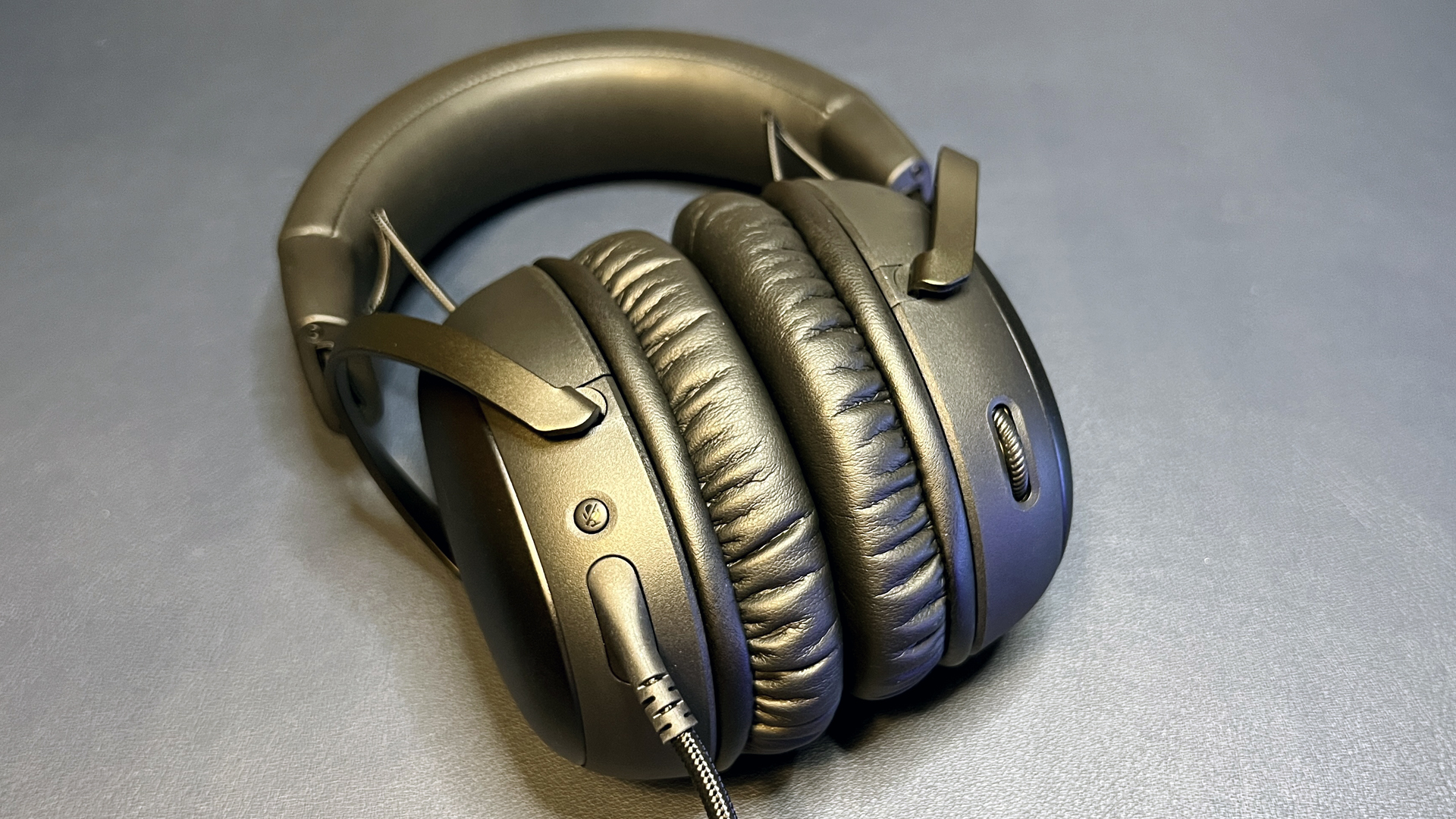 Close-up of the memory foam earpads on a HyperX gaming headset.