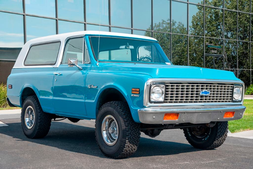 A classic blue 1971 Chevrolet K5 Blazer, representing the early evolution of the SUV.