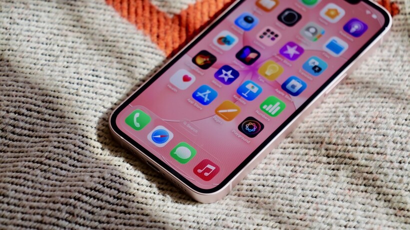 The front of the iPhone 17e showing the iOS home screen and app icons.