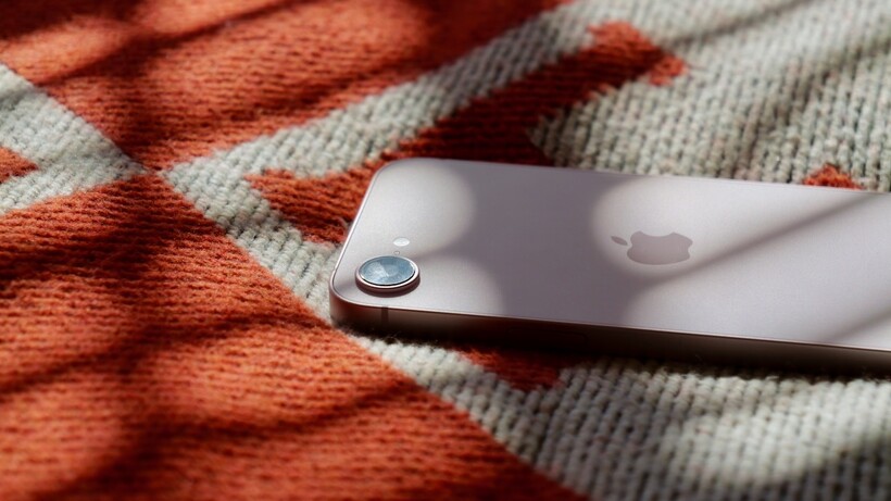 Close-up of the single rear camera lens on the back of the iPhone 17e.