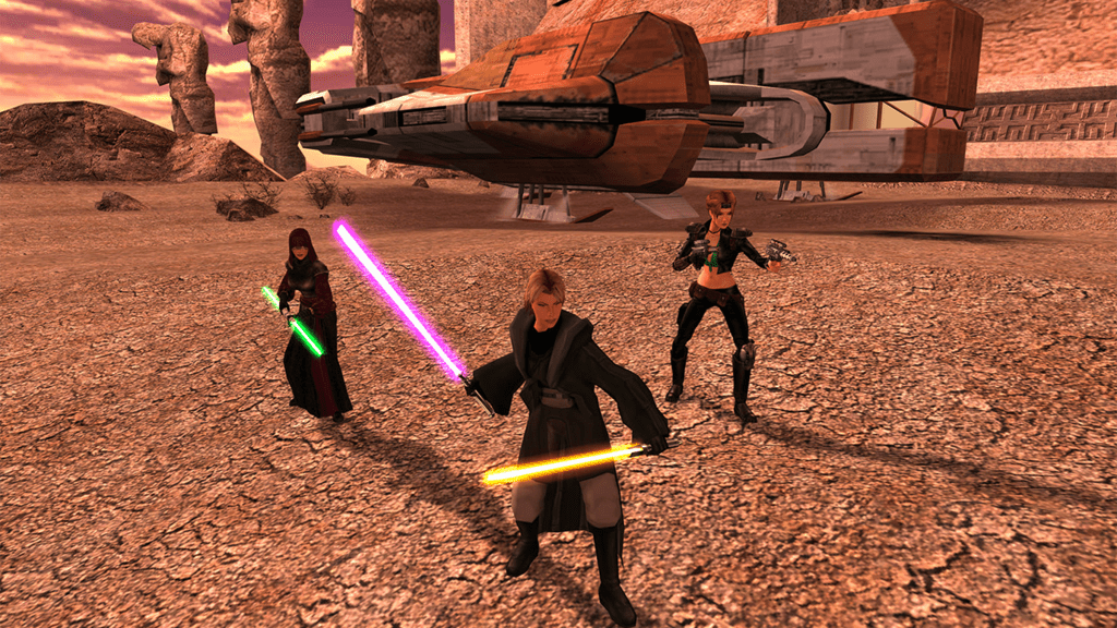 Characters standing in front of the Ebon Hawk ship in Star Wars: Knights of the Old Republic II.