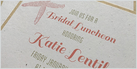 Microscopic detail of tiny inkjet droplets forming a sharp image on textured cardstock.