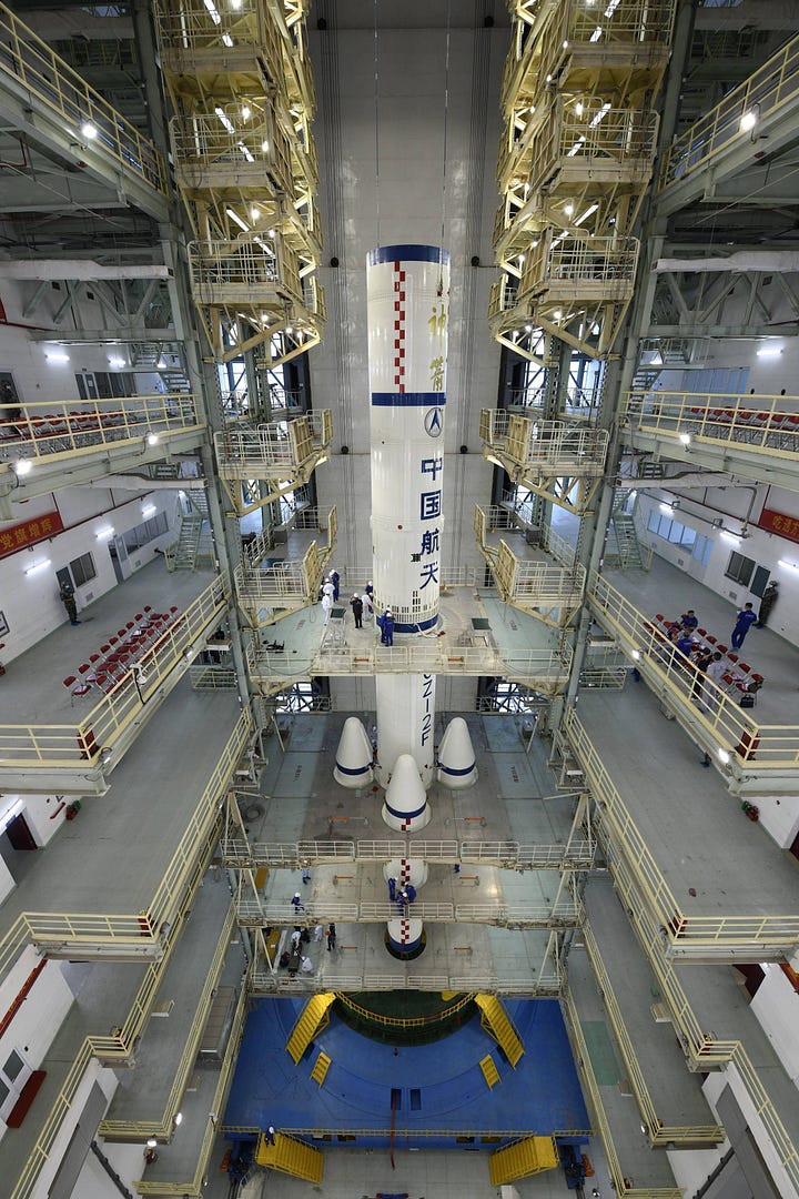 The Long March 2F rocket and Shenzhou spacecraft standing at the Jiuquan Satellite Launch Center.