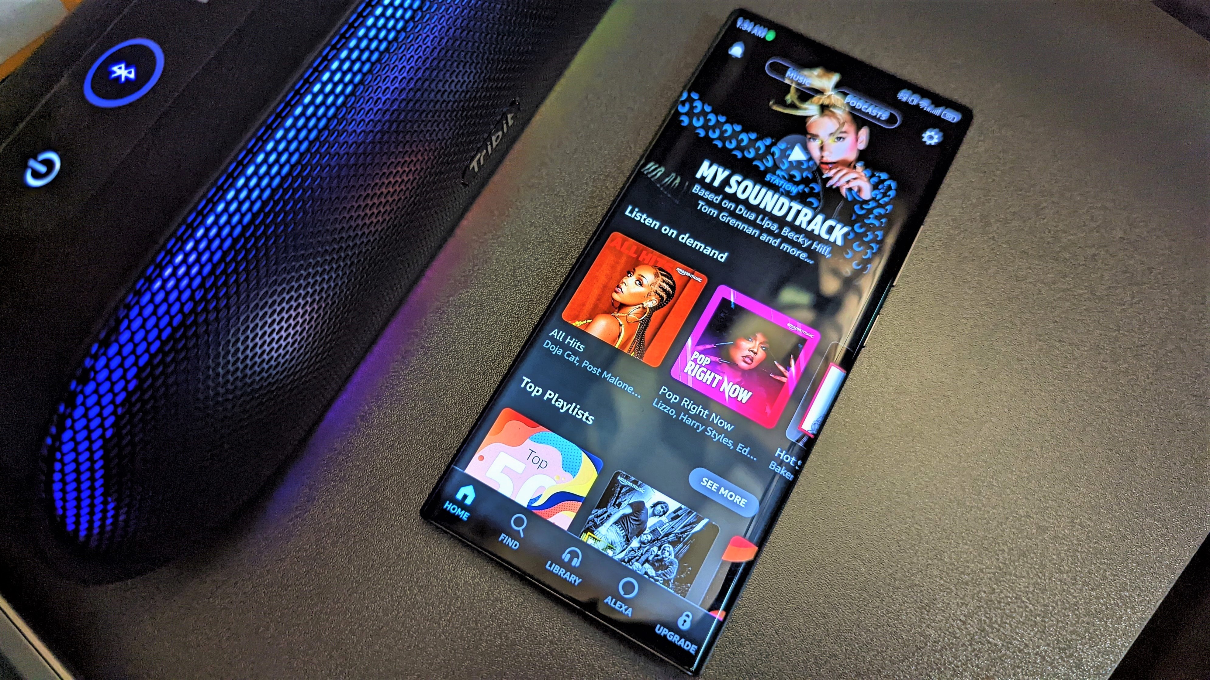 Amazon Music app open on an Android smartphone resting on a table.