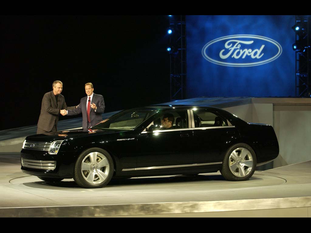Side profile view of the 2003 Ford 427 Concept showing its long wheelbase and 19-inch wheels.