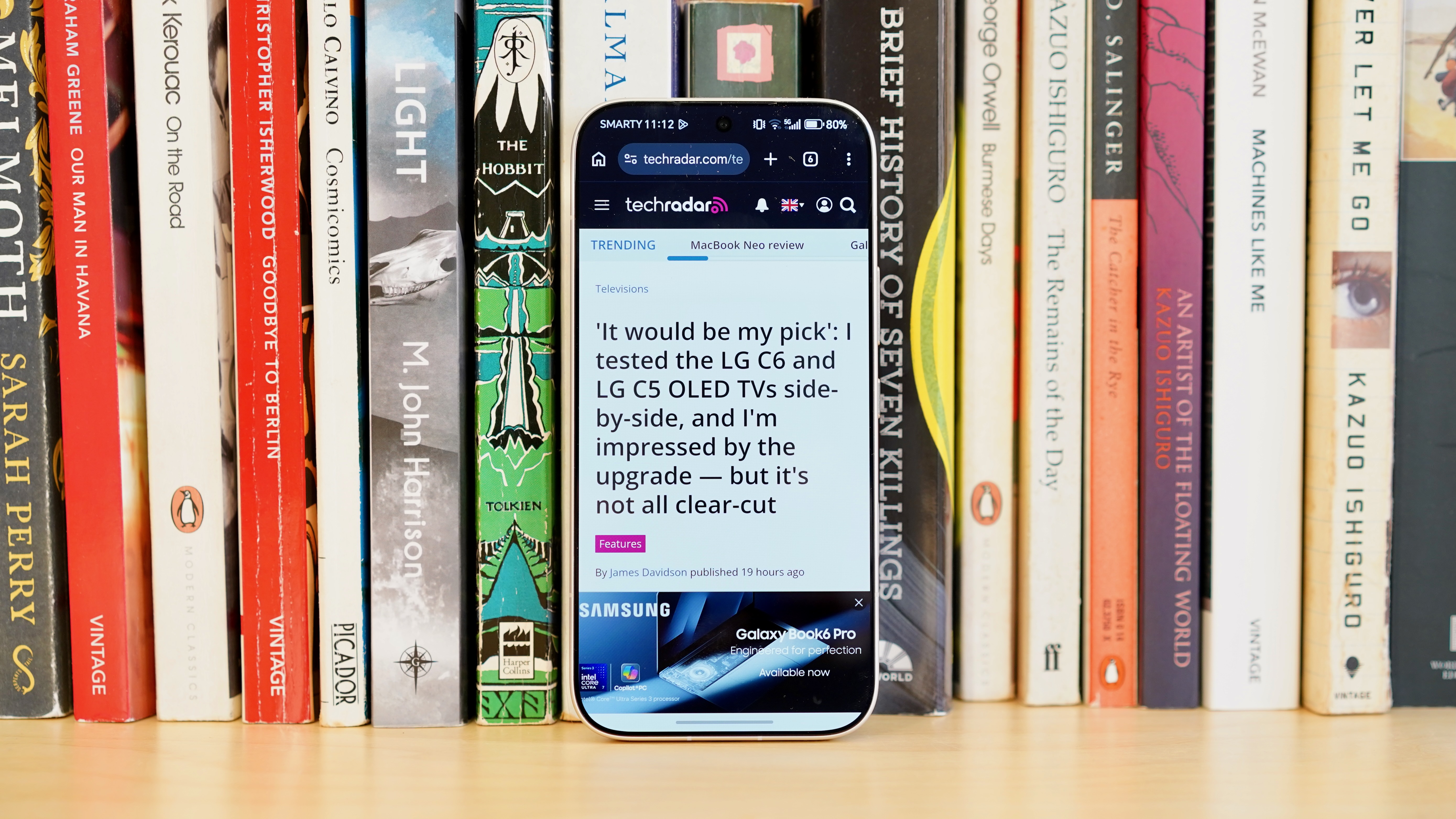 The front display of the Honor 600 Pro glowing brightly with a colorful high-definition wallpaper.